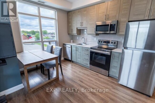 Photo - 6289 McLeod Rd Unit 402