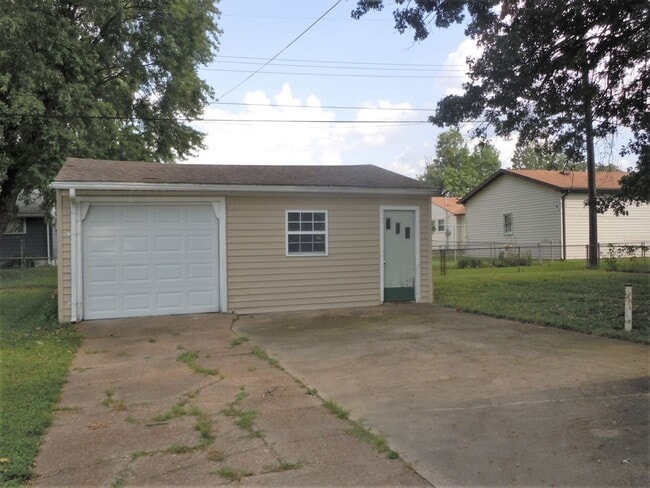 Photo - Two Bedroom House with Main Floor Laundry Hookups and Garage w/ Opener!