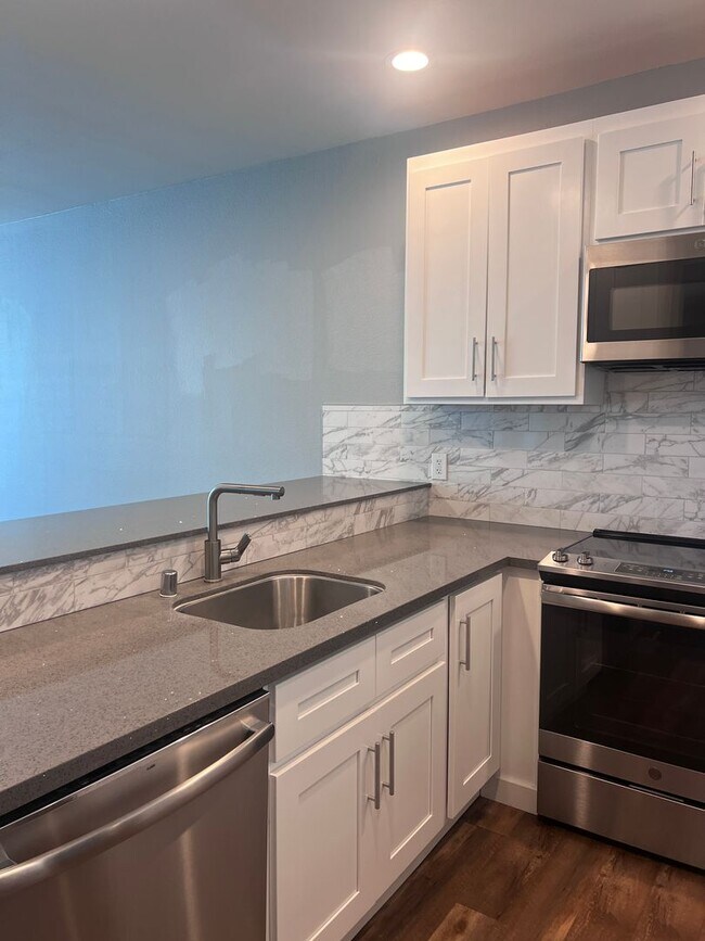 Photo - Spacious 1 Bedroom with Tons of Light, High Ceilings & Full Size Washer/Dryer Inside Unit 113