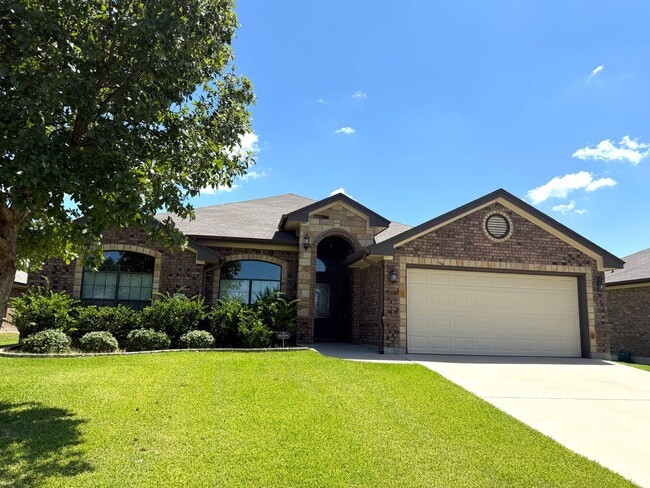 Building Photo - Spacious 4BR Home with Fireplace & Large B...