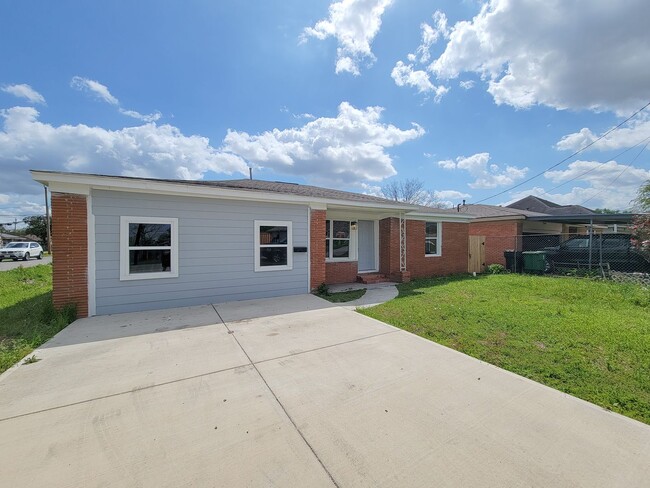 Photo - This beautifully updated 4-bedroom home is just under two miles from Highway 288 and Loop 610, ma...