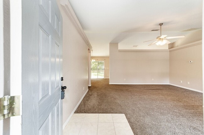 Photo - Peaceful 3-Bedroom Home with Open Floor Plan & Two-Car Garage in Rainbow Lakes Estates!