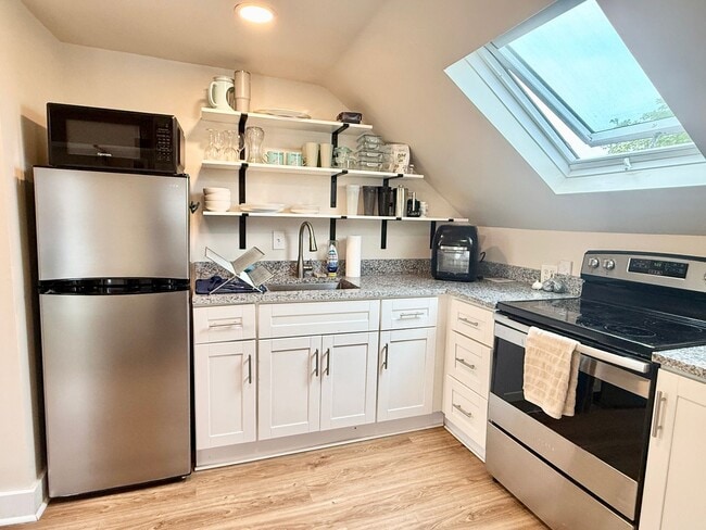 Photo - All Inclusive West End Condo-Fully Furnished with Parking! Unit #3