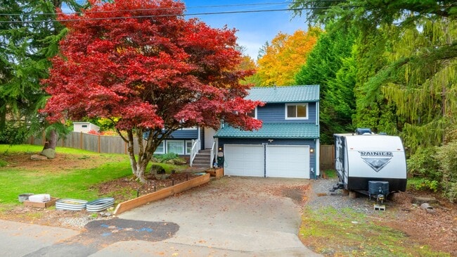 Building Photo - Newly Renovated Bothell Home Sitting on 1 ...