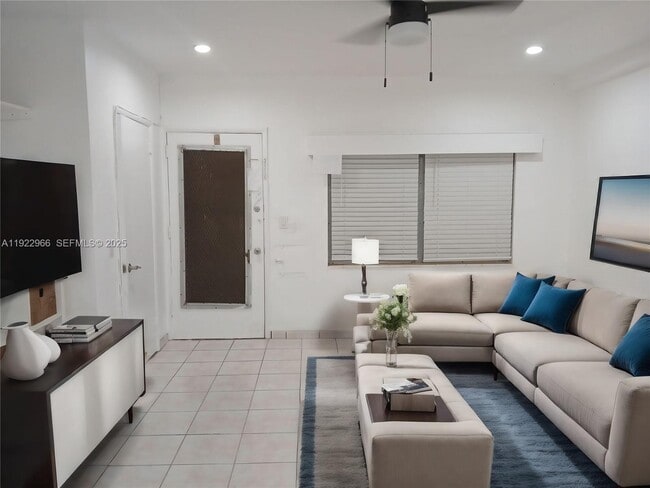 Building Photo - 7300 Byron Ave Unit 8