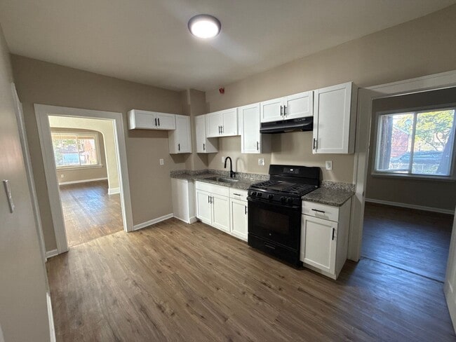 Photo - Freshly Renovated 5-Bedroom Home – Quality...
