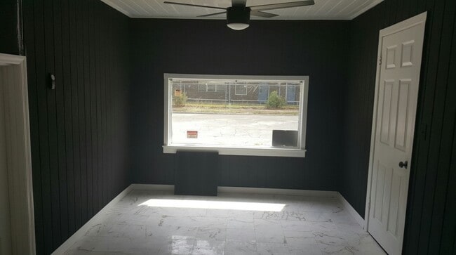 bedroom large window and marble tile - 399 Ave B Ave SE Unit 399. Ave B