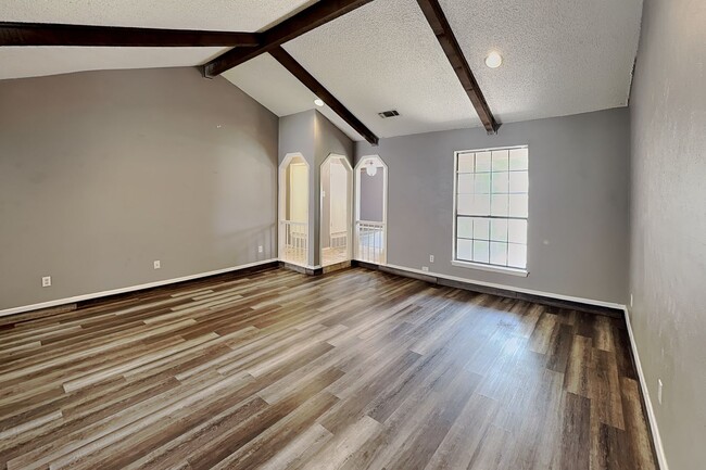 Photo - Darling Fort Worth Duplex! Vaulted Ceilings, Wood Beams & Covered Outdoor Living!