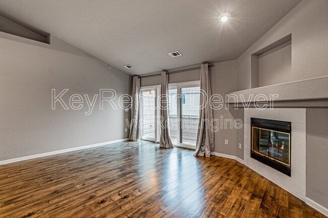 Building Photo - 7388 S Alkire St Unit 306