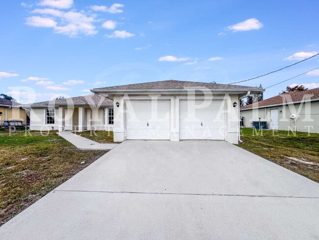 Building Photo - New Year, New House? 3BR/2BA Lehigh Acres Home with Garage, Lawn Care, and Big Main Character Energy