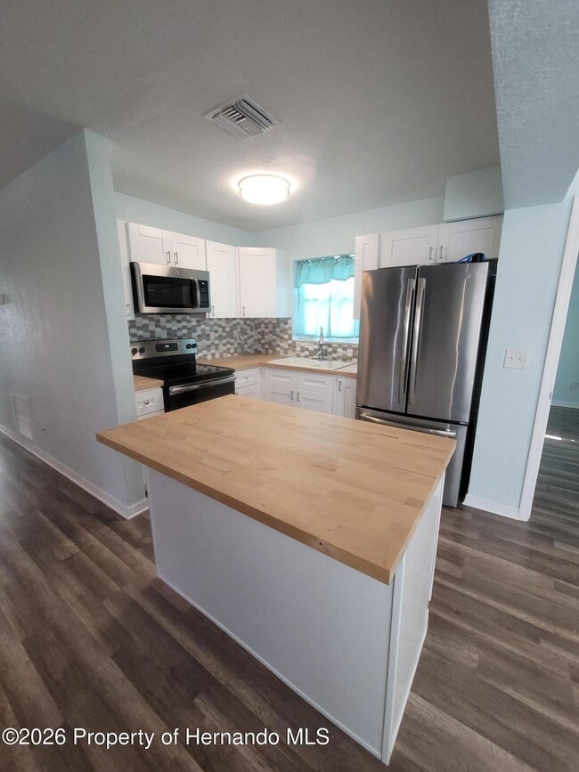 Photo - 513 Hollyhock Ln