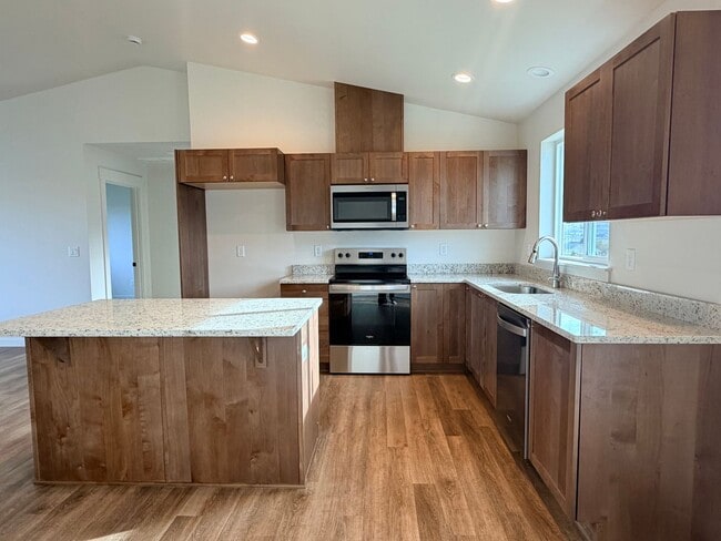 Photo - BRAND NEW construction! 3 beds, 2 baths, double garage, deck with VIEWS and more!
