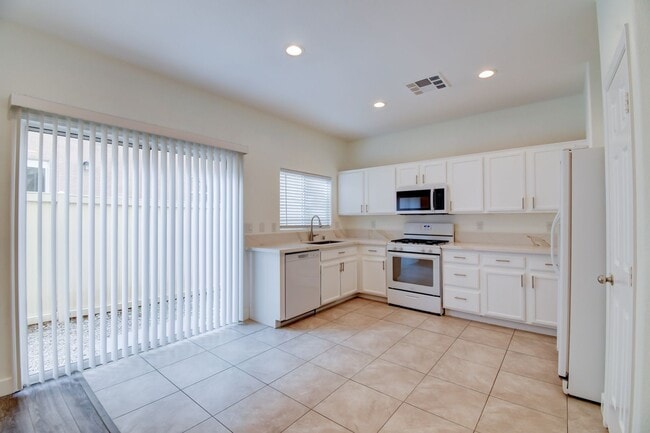 Photo - Great home with 4 bedrooms, 2.5 baths. New Floors Paint and Countertops. Unit 11072 ARCADIA SUNRISE DR