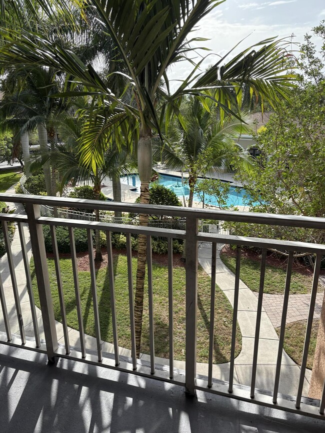 Building Photo - 6529 Emerald Dunes Dr Unit 308 Rental