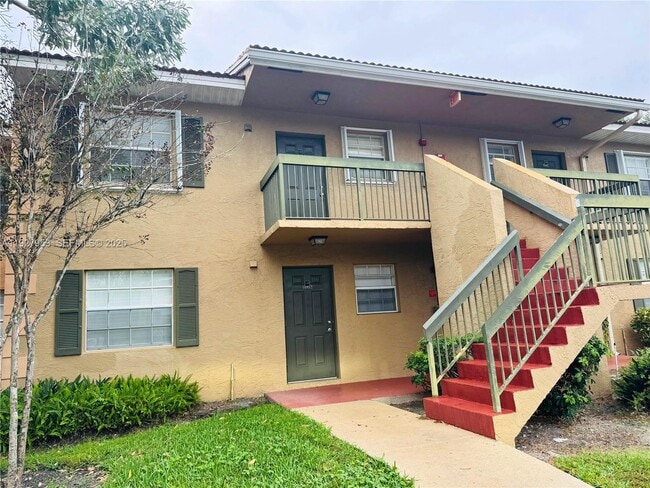 Building Photo - 10457 NW 8th St Unit 105