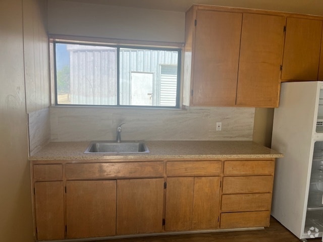 Building Photo - 15287 W Belmont Ave Unit APT A