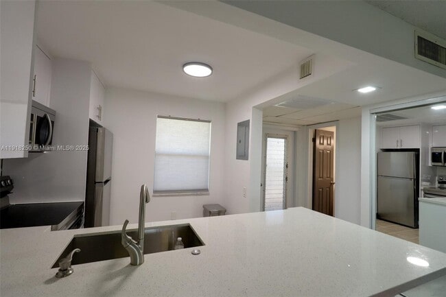 Photo - 9300 Lime Bay Blvd Unit 102