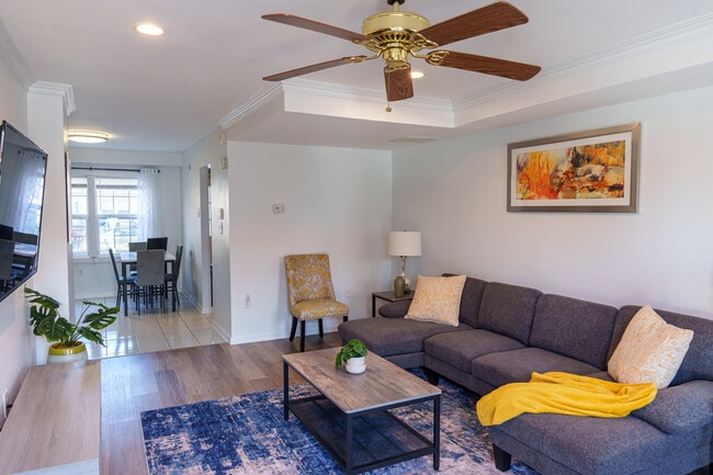 Fully furnished living room with flat screen - 8439 Pioneer Dr