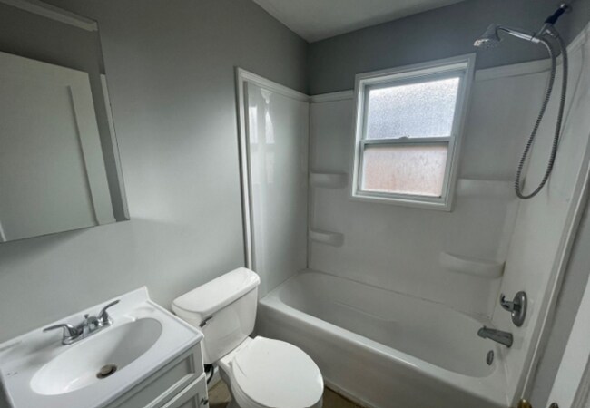 Photo - Charming 2BR Home with 1-Car Attached Garage, Hardwood Floor, and Washer/Dryer Provided!