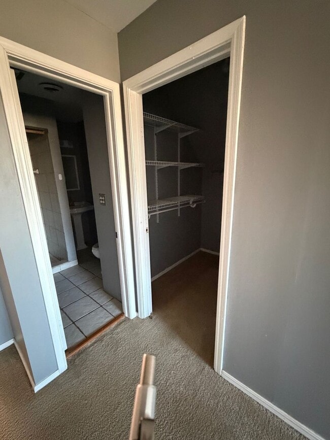 Photo - 2 story house for lease. Open floor plan in kitchen & living. Lots of storage. Large fenced backy...