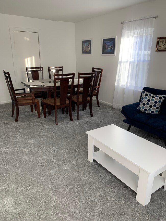 Living Room/Dining Room - 214 Beach 27th St Unit 2