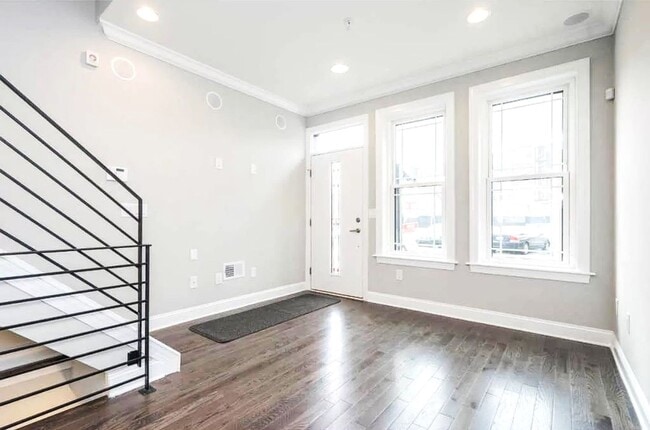 Photo - Gorgeous 3-Bedroom Townhome with Finished Basement and Rooftop Deck! Available mid-June!