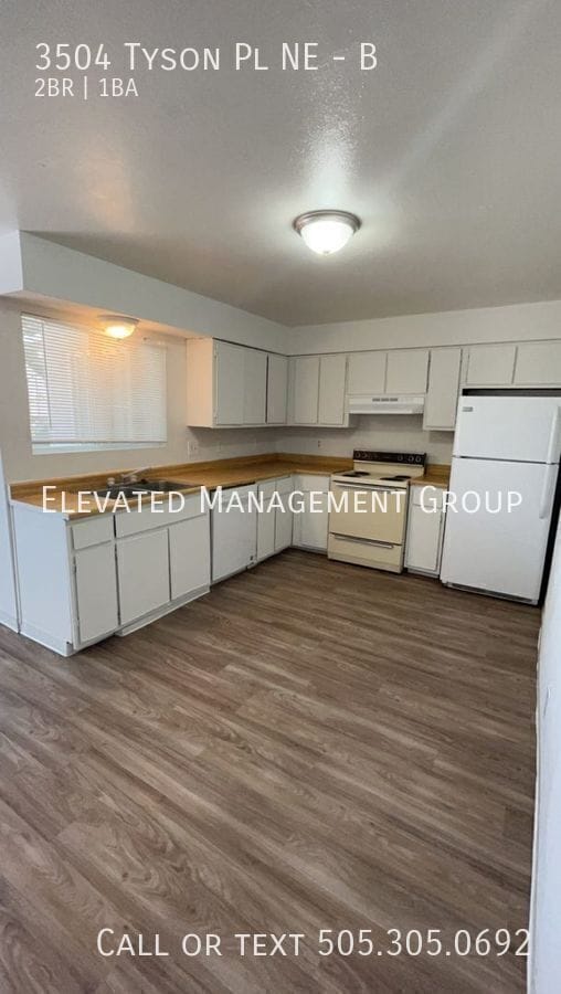 Building Photo - 3504 Tyson Pl NE Unit B