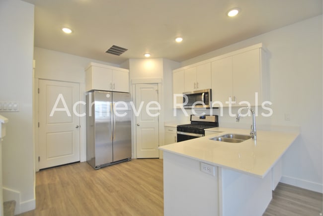 Photo - Woodmore Pointe HOA | Modern Logan Townhome in Prime Location