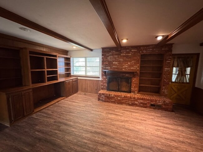 Photo - 2 living areas and a bonus room, new flooring and paint!  Call today for your personal tour 405-6...