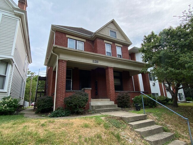 Building Photo - 329 W 8th Ave Unit 1