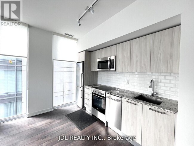 Photo - 28 Wellesley St E Unit 2102