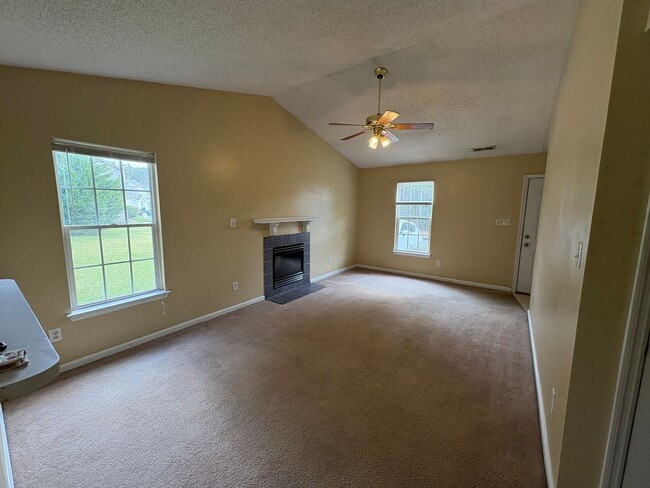 Photo - Charming two bedroom two bath town home that is set on an end unit. This home is just minutes fro...