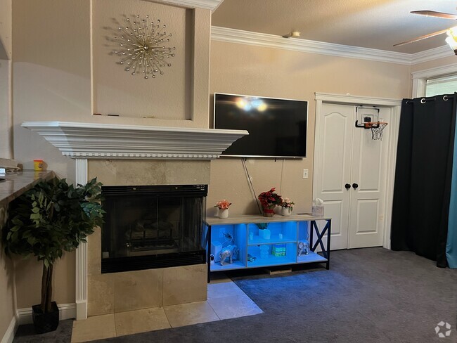 Fireplace in living room - 7400 W Flamingo Rd Unit 1029 Rental