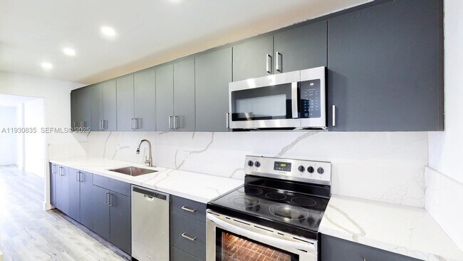 Building Photo - 3660 NE 166th St Unit 710