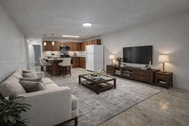 Building Photo - 5615 NW 27th Ct Unit 5615