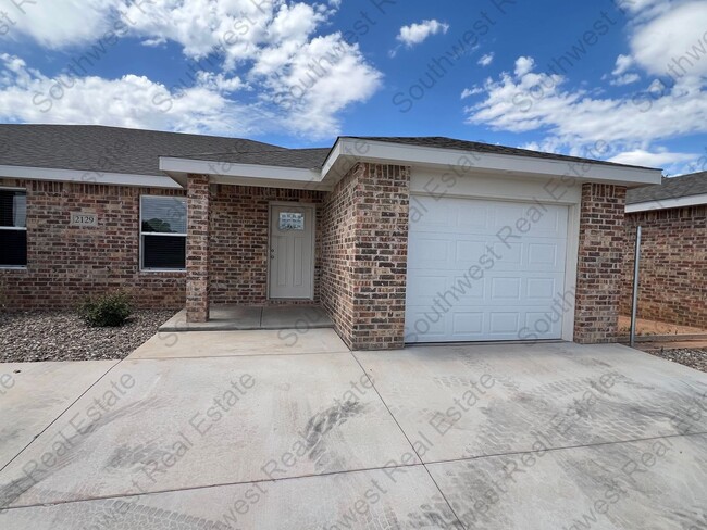 Building Photo - 2129 Bobwhite Ct Unit A Rental