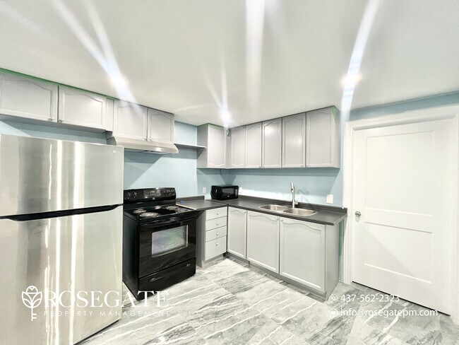 Photo - Bright 1-Bedroom + Den Basement Apartment with All Utilities Included! Unit 2
