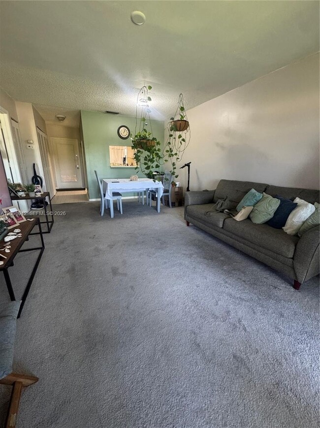 Building Photo - 6550 Royal Palm Blvd Unit 304A