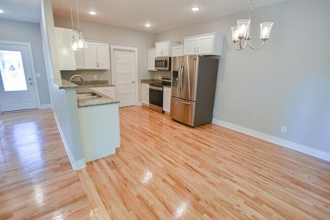Photo - Three Bedroom with Bonus in Sango!