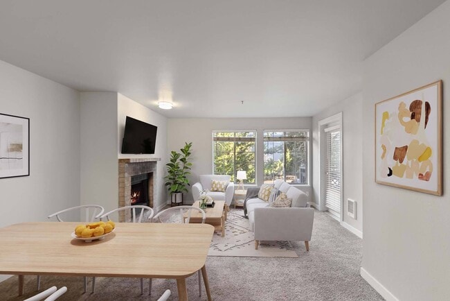 Enjoy a living room designed for both comfort and charm, with expansive windows that flood the space with natural light.