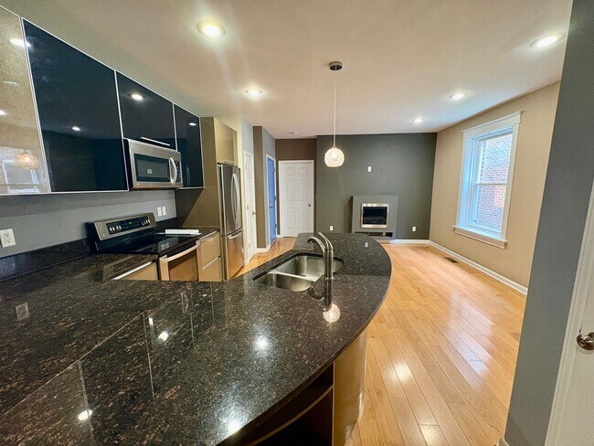 Building Photo - 4164 W Pine Blvd Unit 4164-1E W Pine