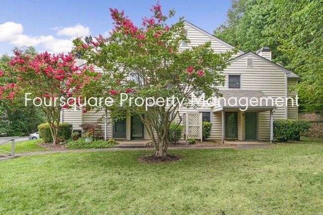 Building Photo - Charming 1st-Floor End-Unit Condo with Gas Log Fireplace, Private Back Porch & Community Pool – T... Unit 110