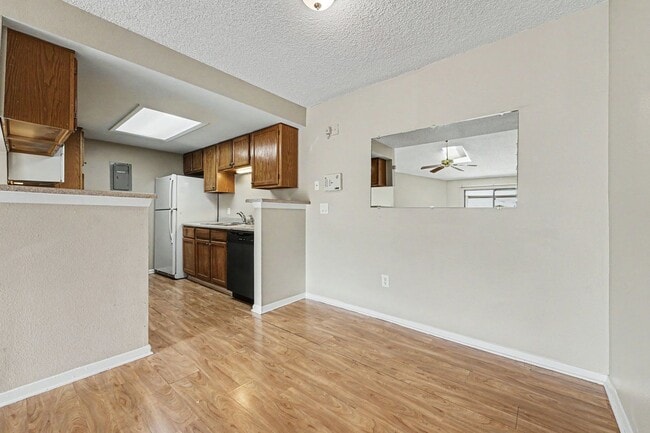 Photo - 2 bedroom 2 bathroom Top-Floor Condo with Balcony, Storage & Parking Unit 208