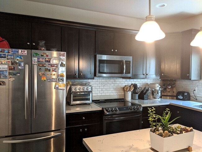 Photo - Stunning three bedroom in CK school district with fully fenced yard, corner lot, AC and more!