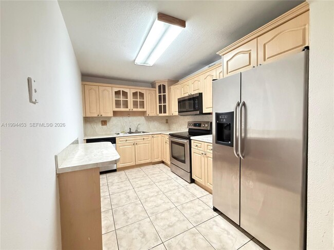 Building Photo - 10000 NW 80th Ct Unit 2521