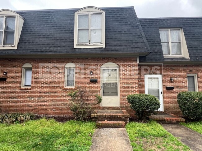 Building Photo - Spacious 2 Bedroom 1.5 Bath Townhome Unit 2401-C