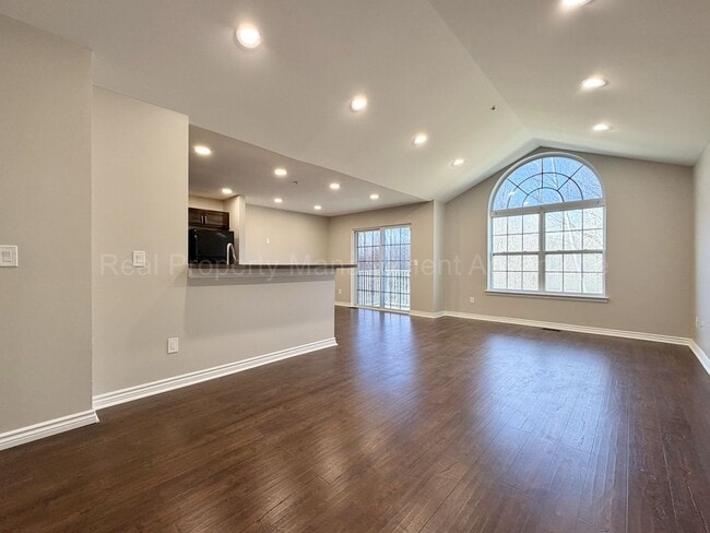 Photo - Rare Corner Upper Condo with Vaulted Ceilings, Private Balcony and 2 Car Garage - Right Across fr...