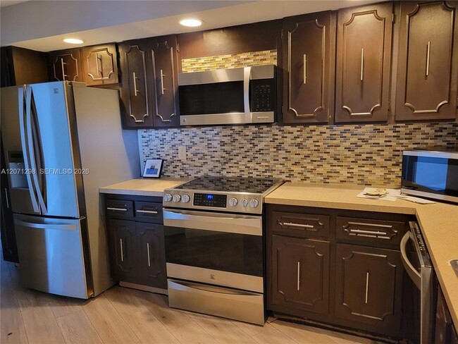 Building Photo - 3090 N Course Dr Unit 405