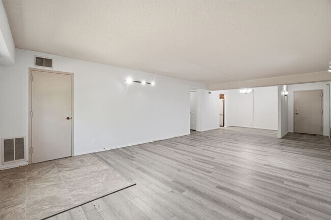 Photo - This expansive ground level residence is set within a serene, gated garden community surrounded b...