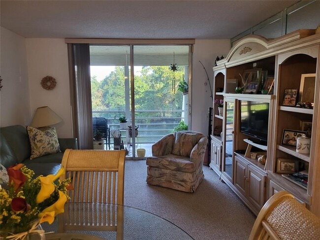 Photo - 9070 Lime Bay Blvd Unit 309